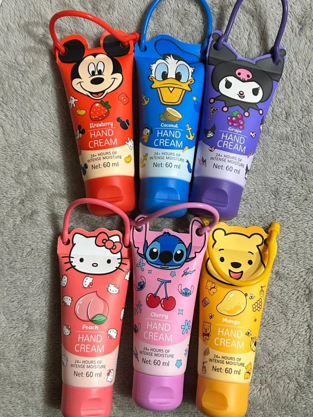 Character Travel Hand Cream Set with Silicone Holders Lot of 6